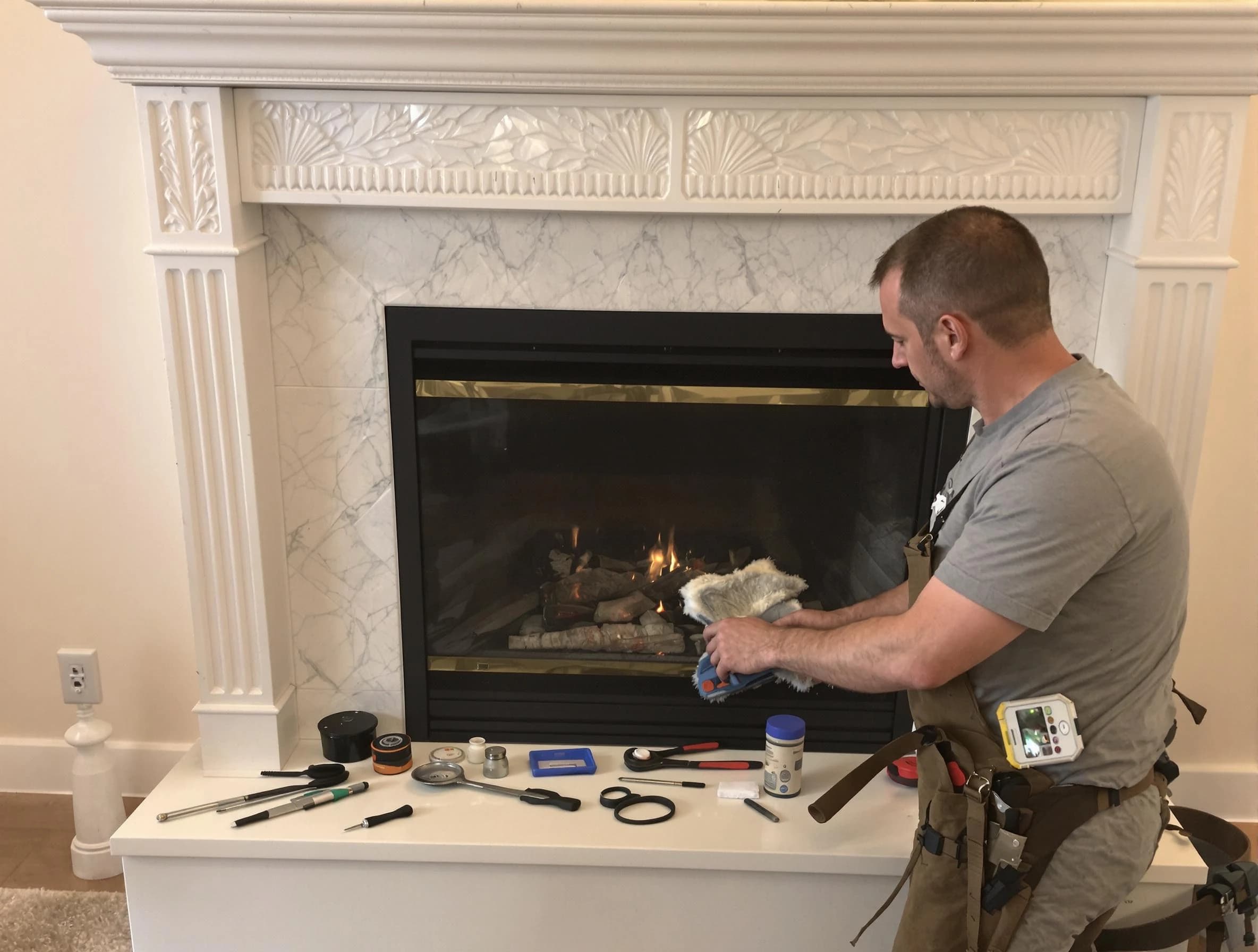 McDonough Chimney Sweep performing fireplace maintenance in McDonough, GA